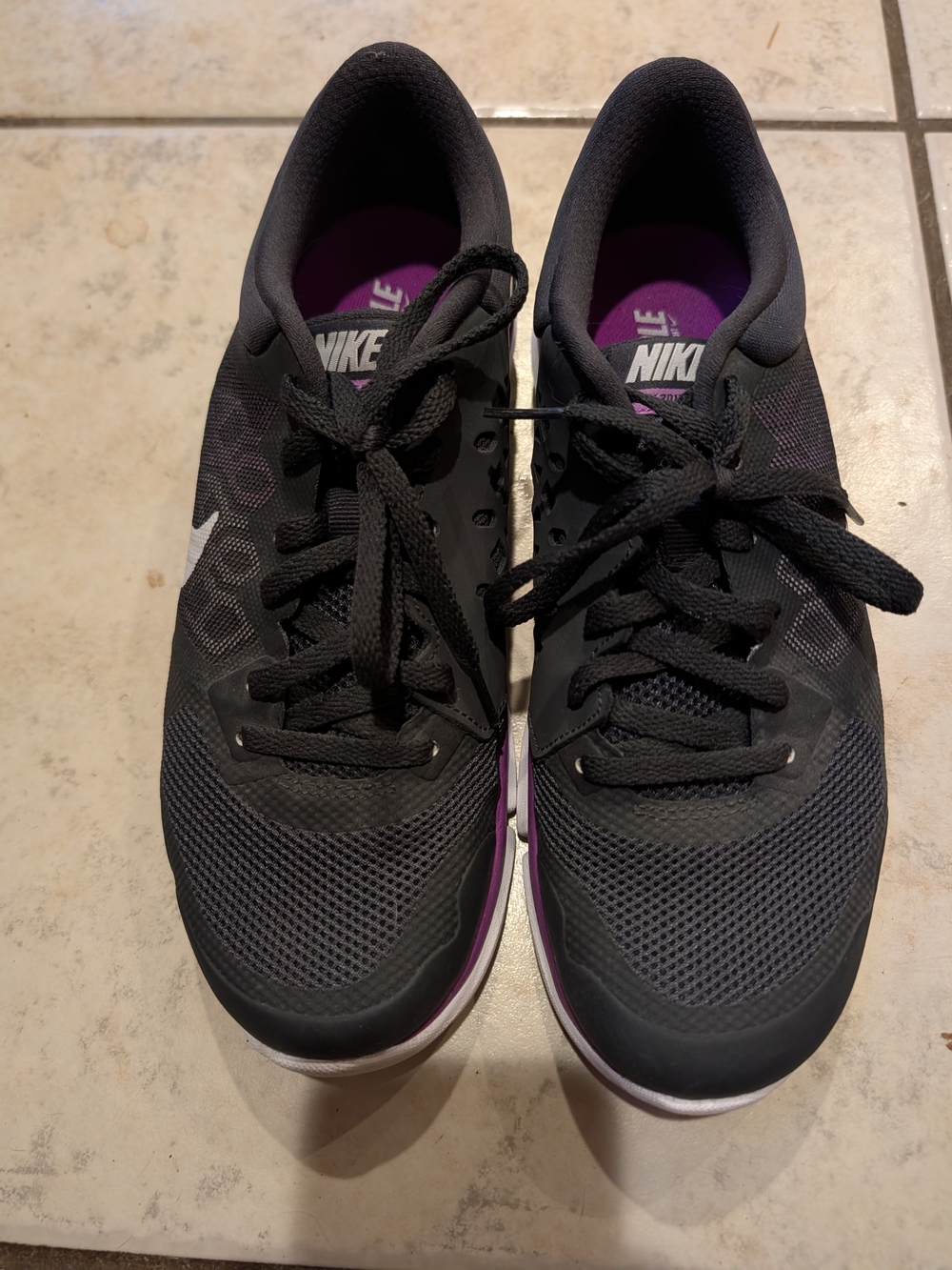 2015 Nike Women’s Black Running Shoes with Purple Insole, Size 8.5